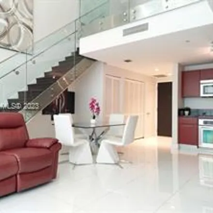 Rent this 2 bed townhouse on T-Mobile in 244 Biscayne Boulevard, Torch of Friendship