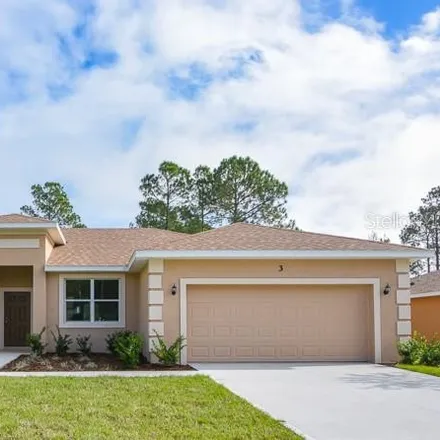 Buy this 4 bed house on 3 Rainmill Place in Palm Coast, FL 32164