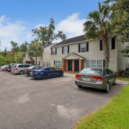 Rent this 4 bed house on 615 North Woodward Avenue in Tallahassee, FL 32304