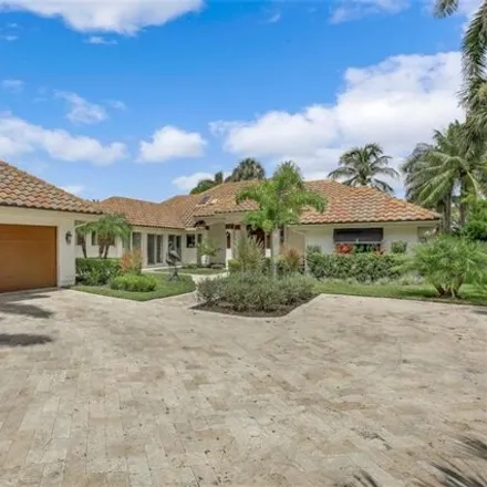 Rent this 4 bed house on 677 Galleon Drive in Naples, FL 34102