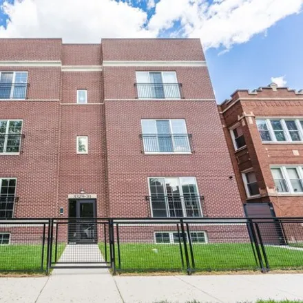 Rent this 3 bed condo on 3329 North Avers Avenue in Chicago, IL 60618