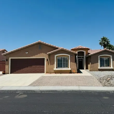Rent this 4 bed house on 81372 Avenida Blanca in Indio, CA 92201