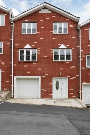 Buy this 3 bed townhouse on 18 Giordan Court in New York, NY 10303