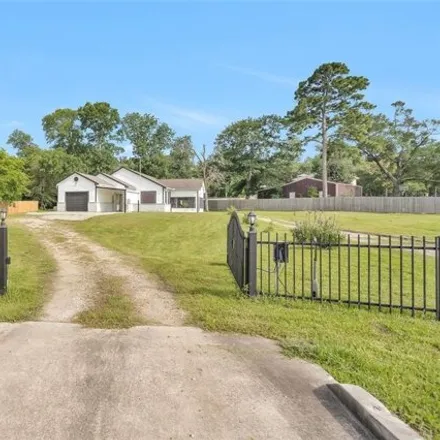 Buy this 3 bed house on 11296 Forest Trails Drive in Montgomery County, TX 77318