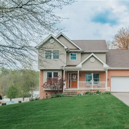 Buy this 4 bed house on 310 Marigold Drive in Carney, Unity Township