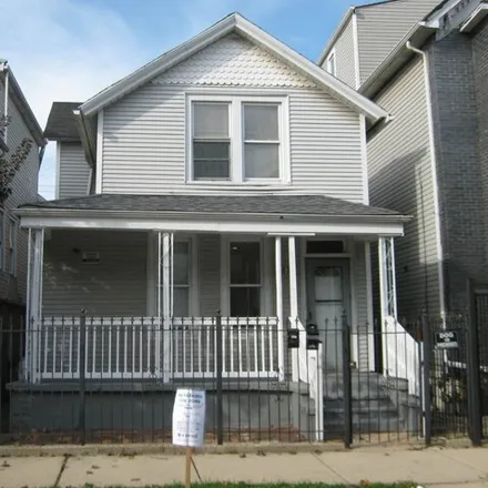 Buy this 4 bed house on 1830 North Mozart Street in Chicago, IL 60647