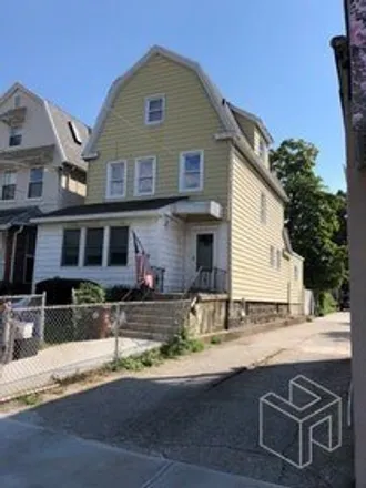 Buy this 5 bed house on 146-12 34th Avenue in New York, NY 11354