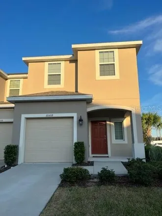 Rent this 3 bed townhouse on 1424 Heirloom Drive in Orange County, FL 32818