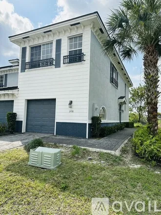 Image 2 - 3450 NW 13 Th St, Unit 3450 - Townhouse for rent