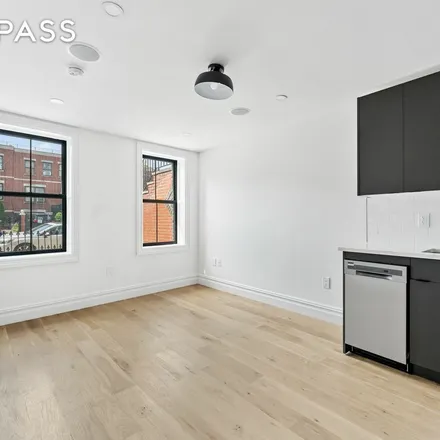 Rent this 1 bed apartment on 63 Hull Street in New York, NY 11233