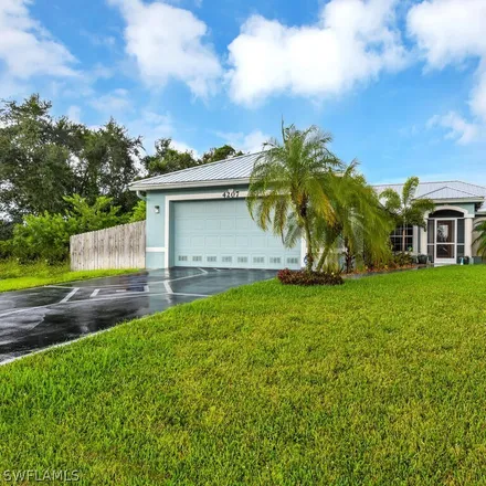 Buy this 4 bed house on 4207 8th Street Southwest in Lehigh Acres, FL 33976