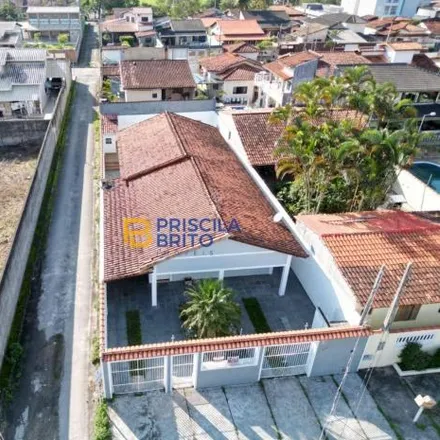 Buy this 4 bed house on Rua Vinte e Dois in Praia das Palmeiras, Caraguatatuba - SP