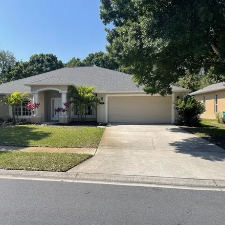 Rent this 4 bed house on 3259 Soft Breeze Circle in West Melbourne, FL 32904