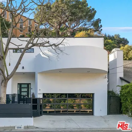 Rent this 4 bed house on 1295 North Beverly Drive in Beverly Hills, CA 90210