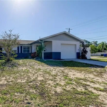 Buy this 4 bed house on 4405 Mc Coy Street in Manors at Manhattan, Tampa