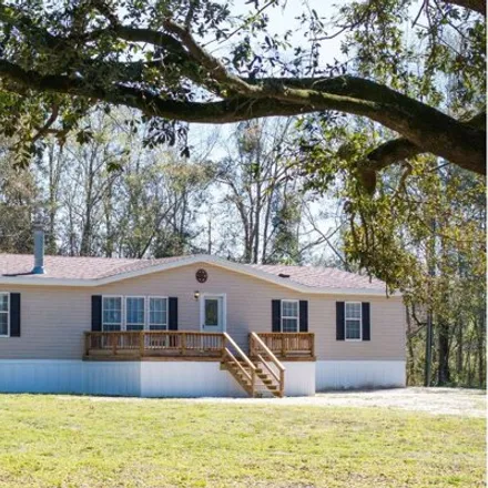 Buy this studio apartment on 13578 106th Place in Suwannee County, FL 32060