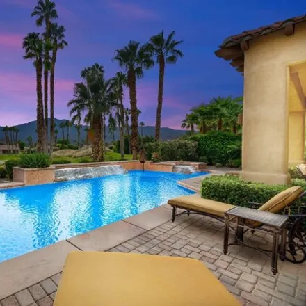 Rent this 4 bed house on Jack Nicklaus Resort Golf Course in Merv Griffin Way, La Quinta