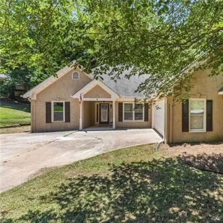 Buy this 3 bed house on 9239 Scarlett Dr SW in Covington, Georgia