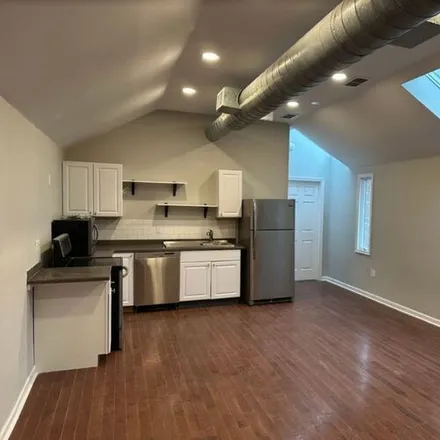 Rent this 3 bed apartment on 7028 Ridge Ave