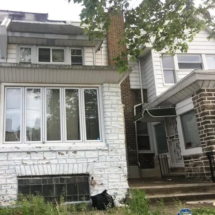 Buy this 4 bed house on 1438 West Nedro Avenue in Philadelphia, PA 19141