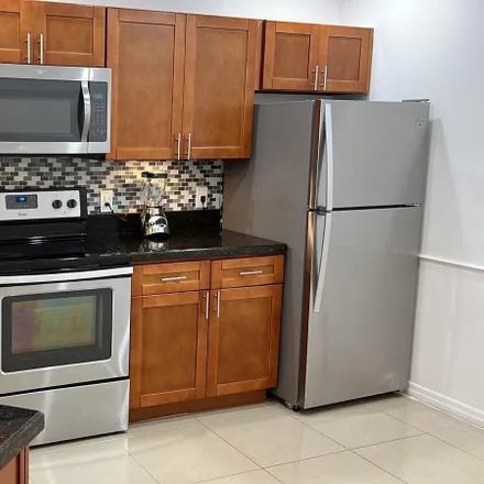 Rent this 2 bed condo on 8721 Wiles Road in Coral Springs, FL 33067