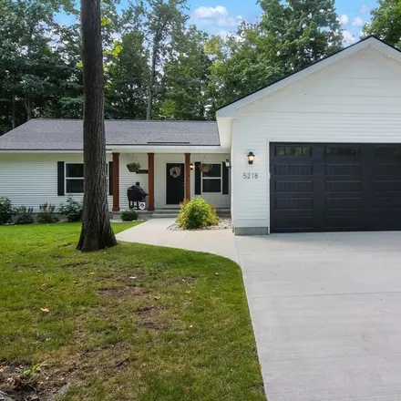 Buy this 4 bed house on 5194 Matthew Drive in Long Lake Township, MI 49684