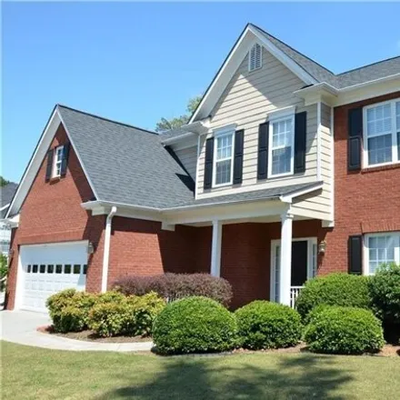 Rent this 4 bed house on 1559 Hampton Woods Drive in Gwinnett County, GA 30043