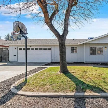 Buy this 4 bed house on 2659 West Country Avenue in Visalia, CA 93277