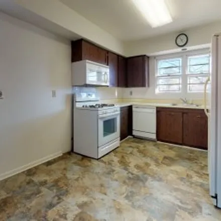 Rent this 3 bed apartment on 6500 Greenspring Avenue