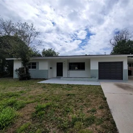 Rent this 3 bed house on 336 Davison Avenue Northeast in Saint Petersburg, FL 33703