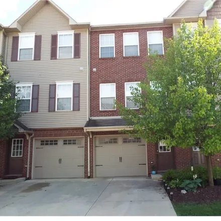 Rent this 2 bed townhouse on 2161 Knotty Pine Trail