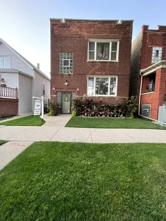 Buy this 6 bed duplex on 5518 West Drummond Place in Chicago, IL 60639