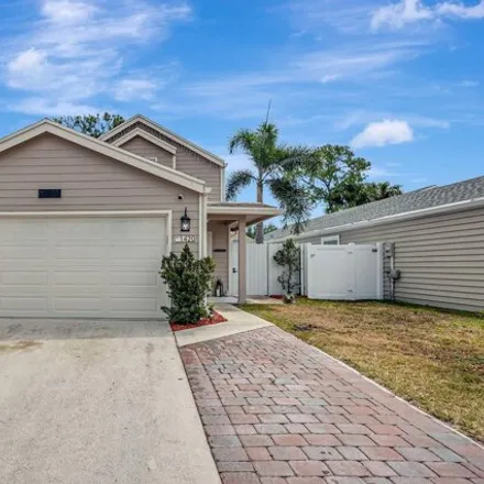 Buy this 4 bed house on 5837 Azalea Circle in Palm Beach County, FL 33415