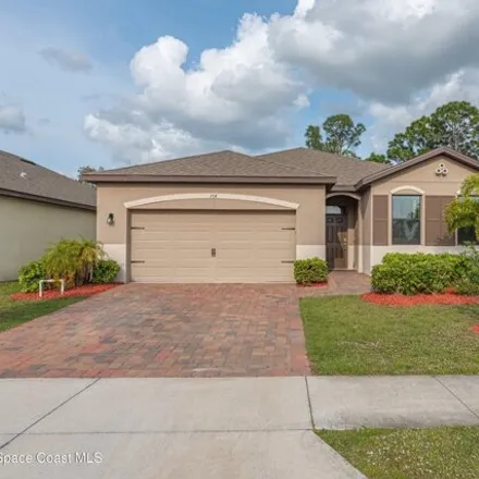 Rent this 4 bed house on 714 Old Country Rd SE in Palm Bay, Florida