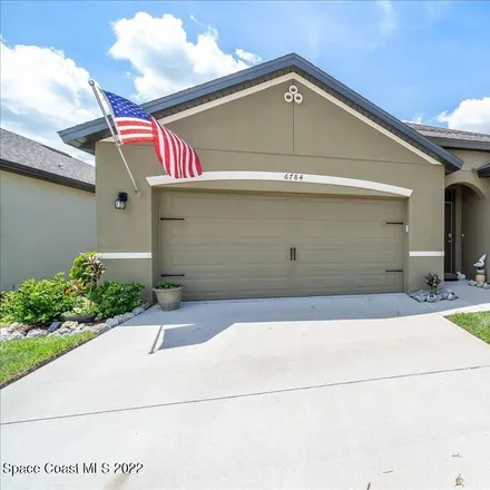 Buy this 4 bed house on 399 Sarong Circle in Merritt Island, FL 32952