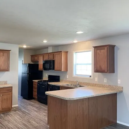 Buy this studio apartment on 6058 Hickory Trail in White Lake Charter Township, MI 48383