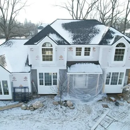 Buy this 4 bed house on 5611 Old Orchard Trail in Orchard Lake Village, MI 48324