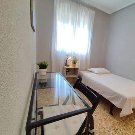 Rent this 4 bed room on Calle de Monte San Marcial in 28053 Madrid, Spain