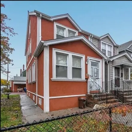 Buy this 4 bed house on 84-01 107th Avenue in New York, NY 11417