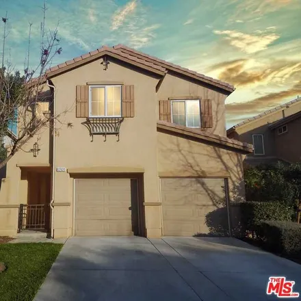 Rent this 4 bed house on 12920 Dolomite Lane in Moreno Valley, CA 92555