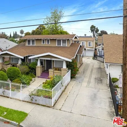 Buy this 5 bed house on 4118 Denker Avenue in Los Angeles, CA 90062