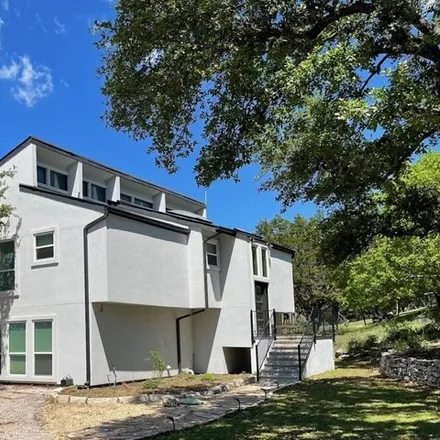 Rent this 4 bed house on 7206 Comanche Trail in Travis County, TX 78732
