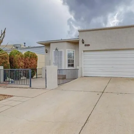 Buy this 4 bed house on 6933 Black Pine Place Northeast in Albuquerque, NM 87109