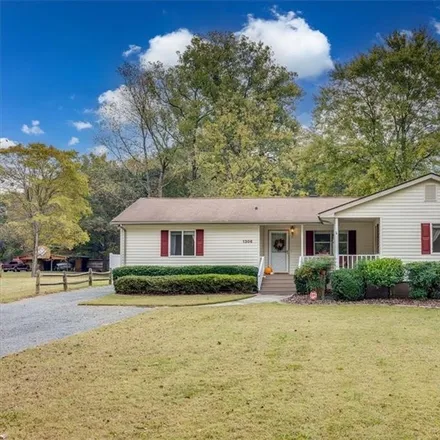 Buy this 3 bed house on 1304 Riverside Drive in Charlotte, NC 28214