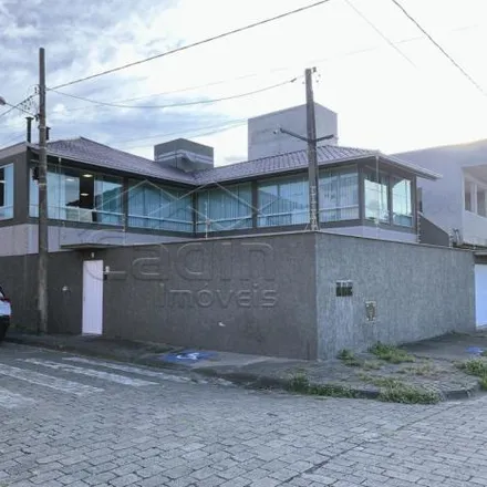 Buy this 8 bed house on Rua Alfredo José Rebello in Meia Praia, Navegantes - SC