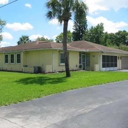 Rent this 2 bed duplex on 306 Highland Avenue in Lehigh Acres, FL 33936