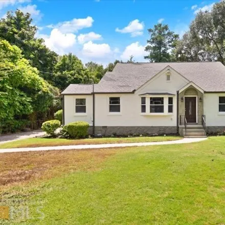 Buy this 4 bed house on 3199 McAfee Rd in Decatur, Georgia