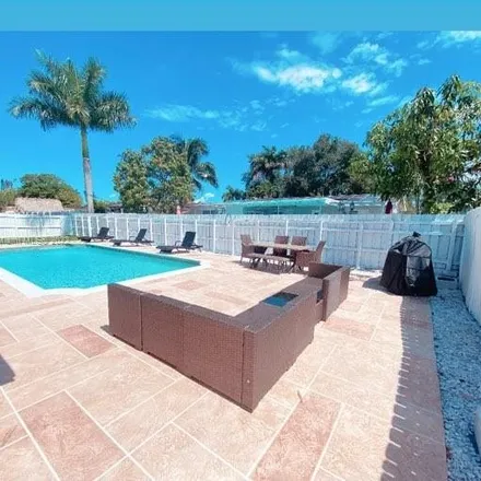 Rent this 5 bed house on 11031 Northwest 21st Street in Pembroke Pines, FL 33026