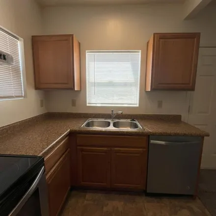 Rent this 2 bed apartment on 1615 East Miles Street in Tucson, AZ 85719