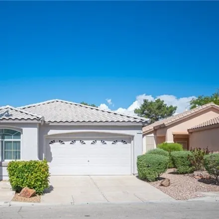 Buy this 3 bed house on 10242 Bentley Oaks Avenue in Summerlin South, NV 89135
